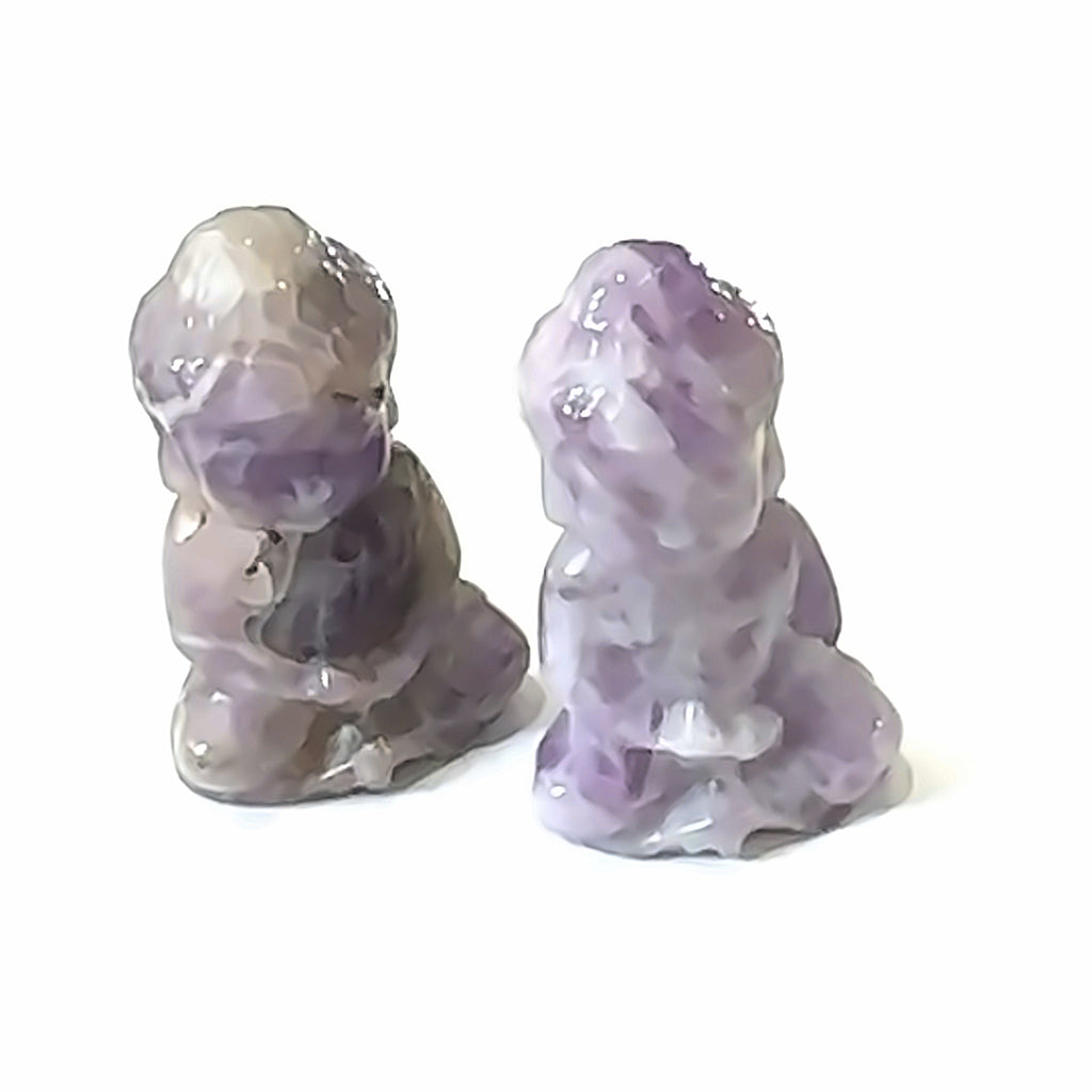 Amethyst Gemstone Buddha grouping on white overview