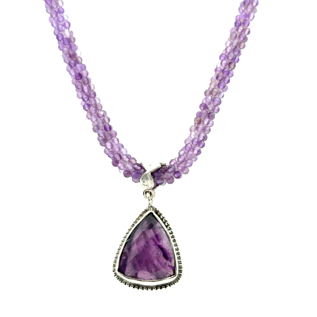 Reiki jewelry in Boston handmade with ethically sourced amethyst gemstones  center view