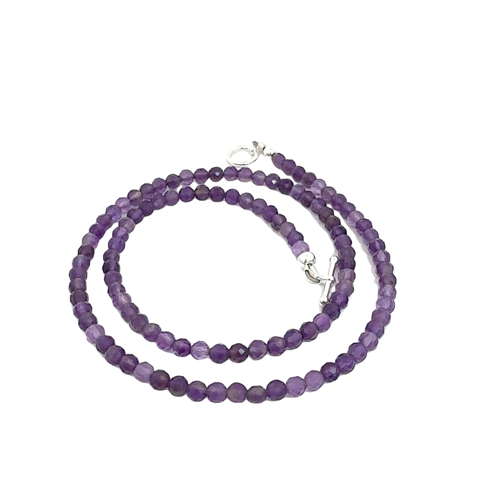 Amethyst Gemstone Necklace on white spiral right angle overview