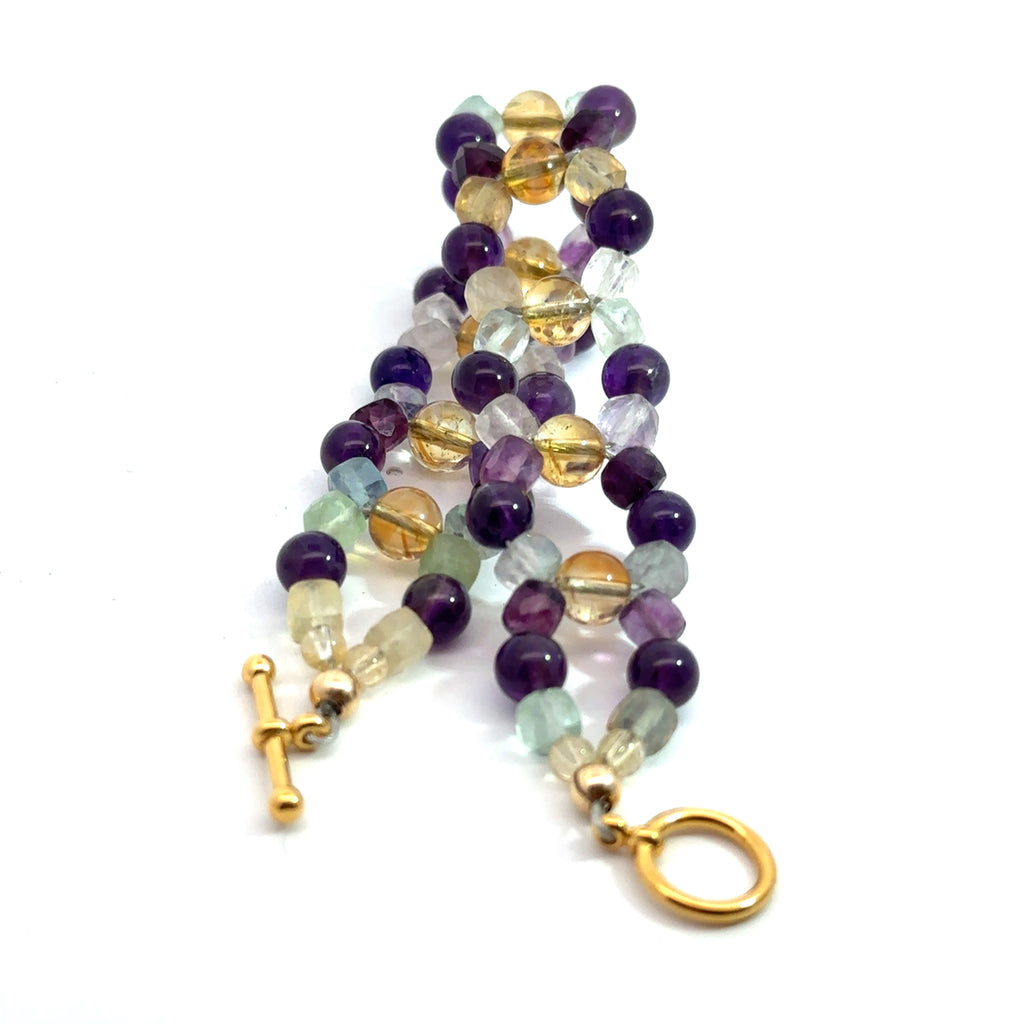 Amethyst, Rainbow Fluorite & Citrine Cross-Weave Bracelet on white front and center twist view
