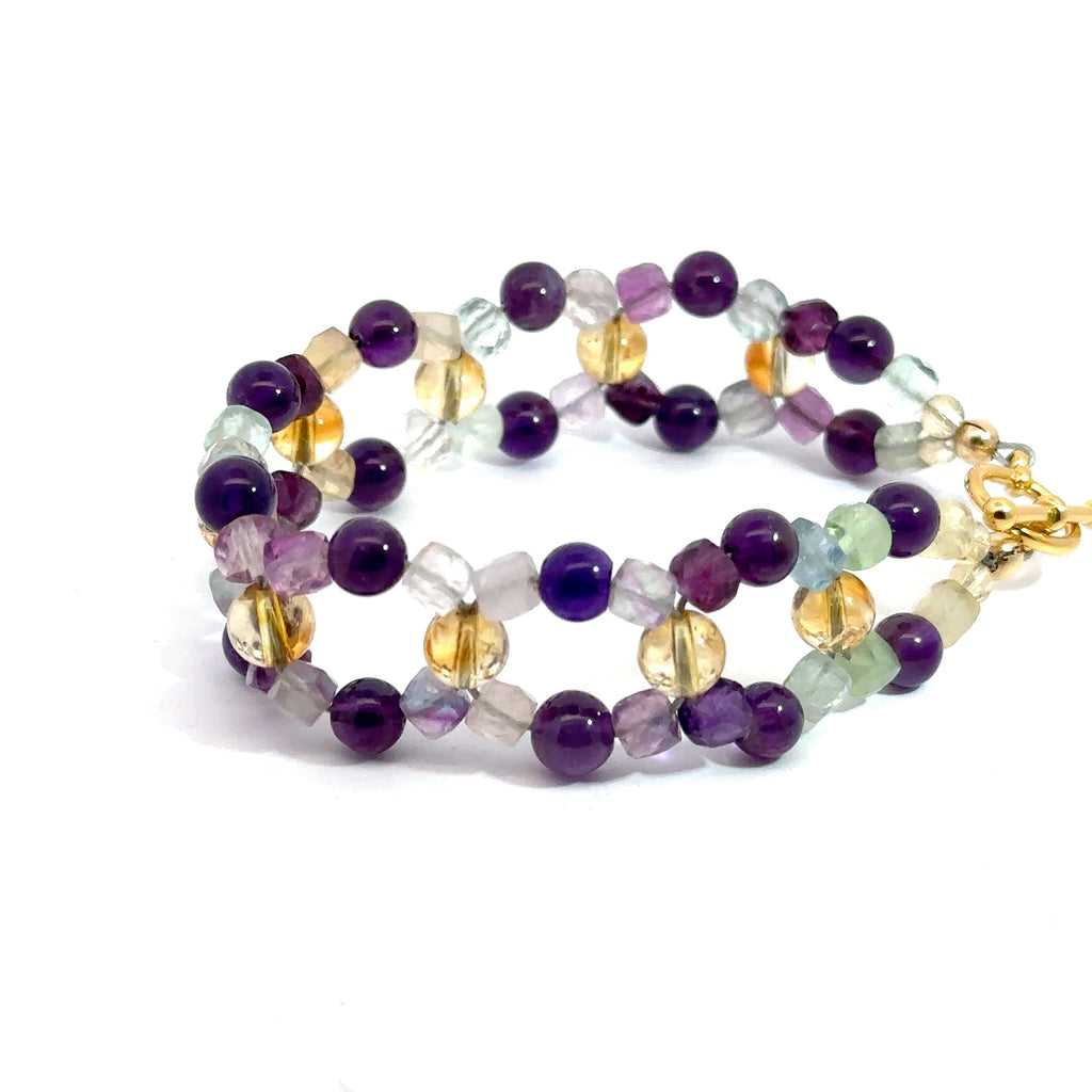 Amethyst, Rainbow Fluorite & Citrine Cross-Weave Bracelet on white right side and angled view