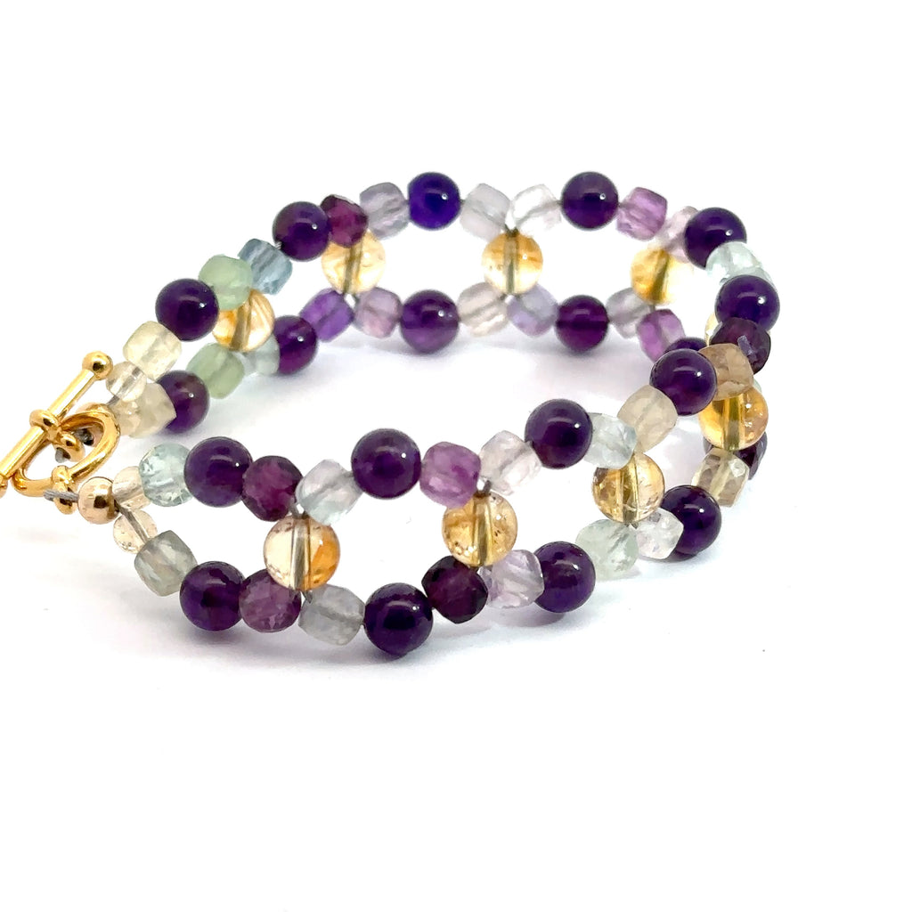 Amethyst, Rainbow Fluorite & Citrine Cross-Weave Bracelet on white side and angled view