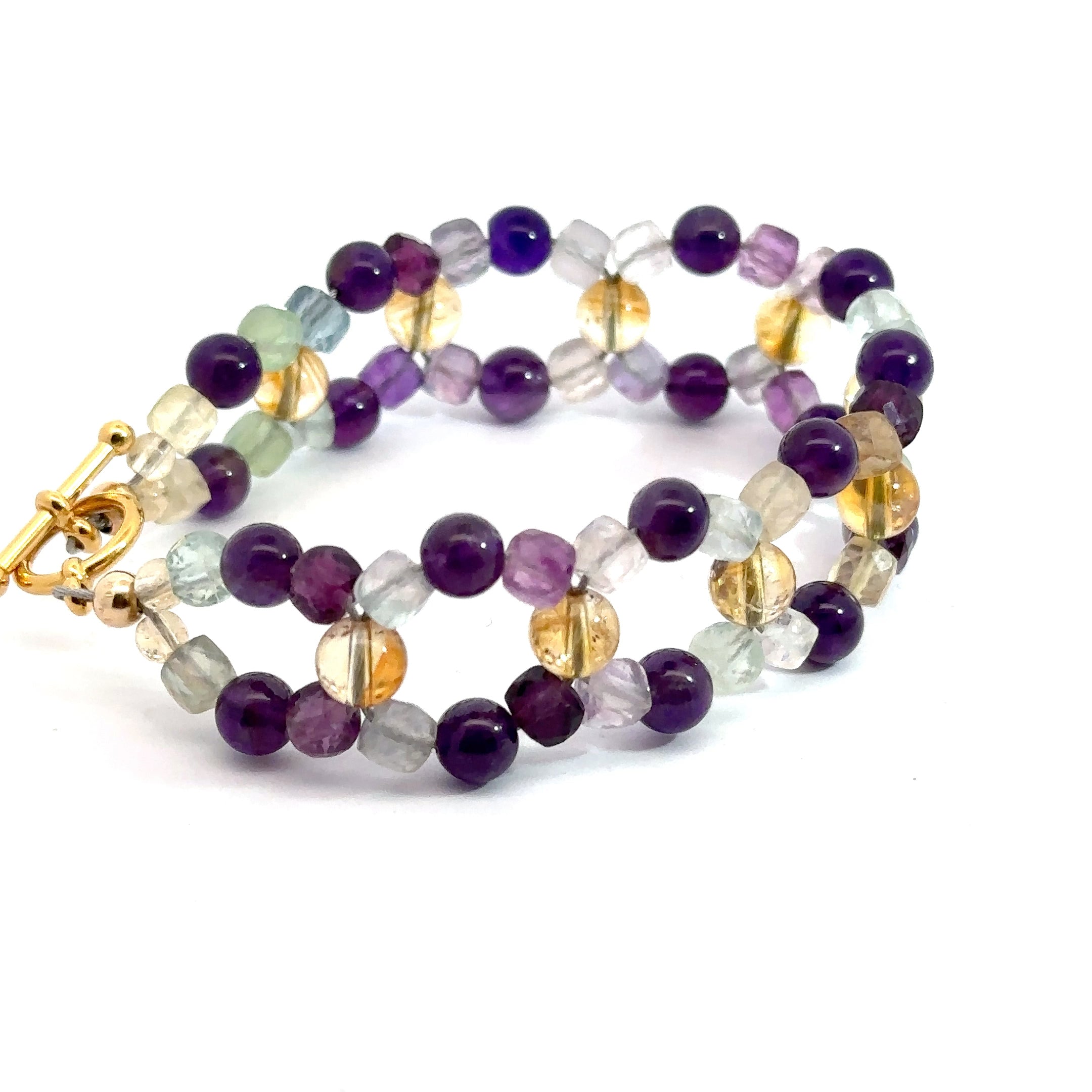 Amethyst, Rainbow Fluorite & Citrine Cross-Weave Bracelet on white side and angled view