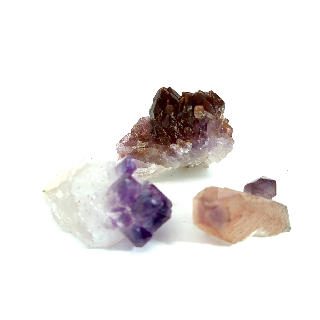 Amethyst Raw Gemstone Collector’s Piece grouping on white front overview