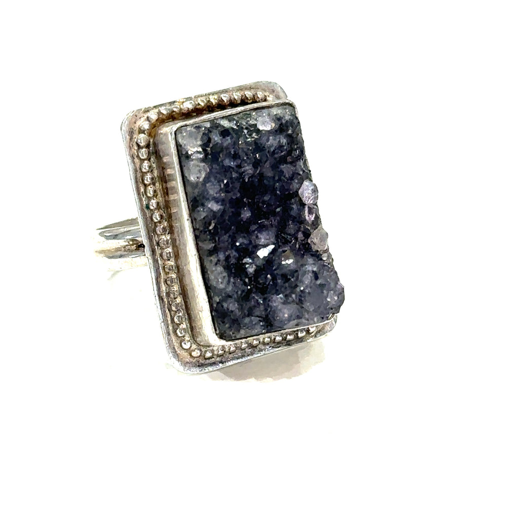 Amethyst druzy gemstone ring in sterling silver, size 6.75, symbolizing intuition and healing on white right angled front view