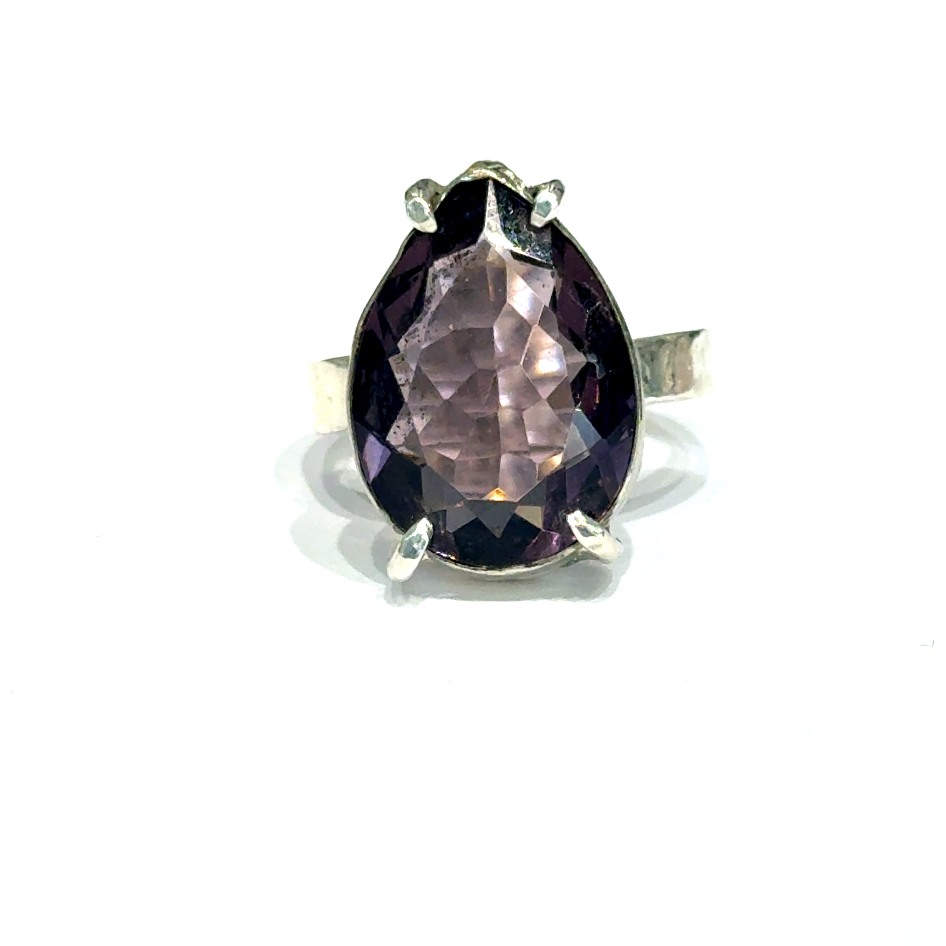 An Ametrine Ring with a purple teardrop-shaped gemstone on a  white background, front view.
