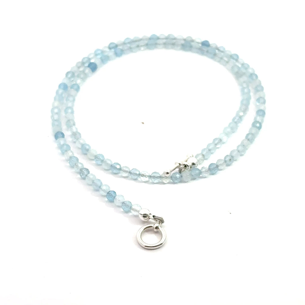 Aquamarine Gemstone Beaded necklace on white back side spiral view