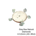 Assorted raw diamonds in perky boxes, representing purity and light. (gray natural diamond 4-5.5mm .40- .90ct) on white front view