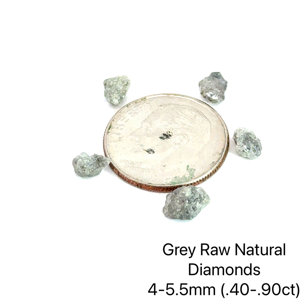 Assorted raw diamonds in perky boxes, representing purity and light. (gray natural diamond 4-5.5mm .40- .90ct) on white front view