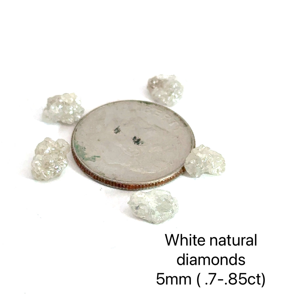 Assorted raw diamonds in perky boxes, representing purity and light. (white  natural diamond 5mm .7-.85ct) on white front view