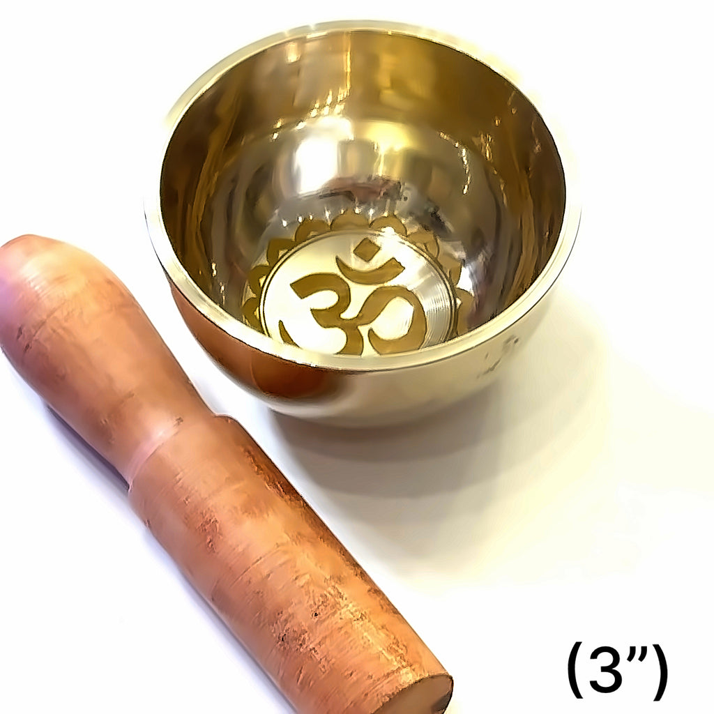 Authentic Himalayan singing bowl handmade in Nepal with mallet on white overview