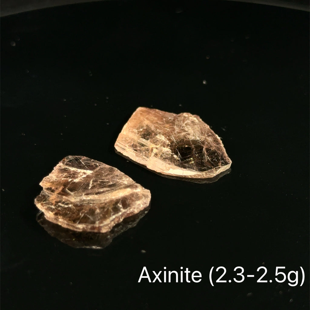 Axinite Raw Gemstones 2.3-2.5g on black 