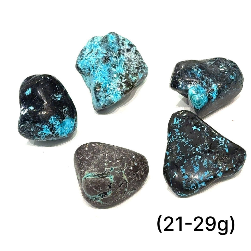 Azurite and Chrysocolla gemstone with deep blue and green patterns symbolizing intuition and empowerment of (21-29g) on white overview