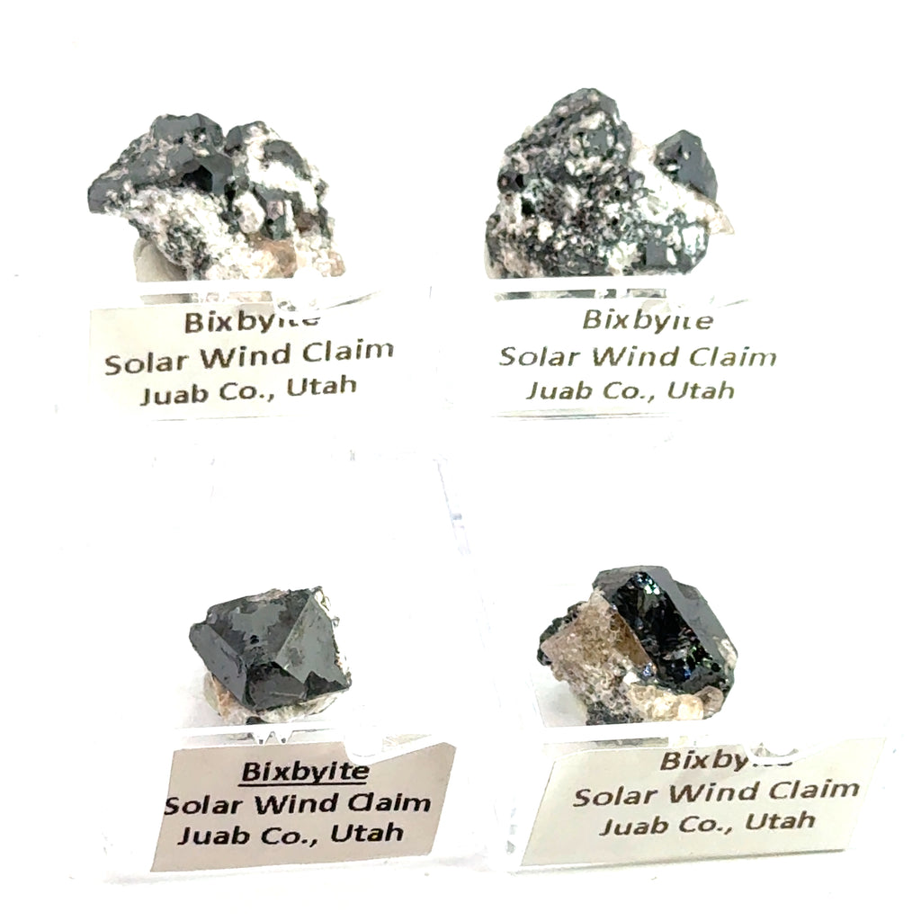 Bixbyite Gemstone grouping on white front view