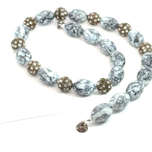 Black & White Marbled Beaded Necklace on white spiral overview