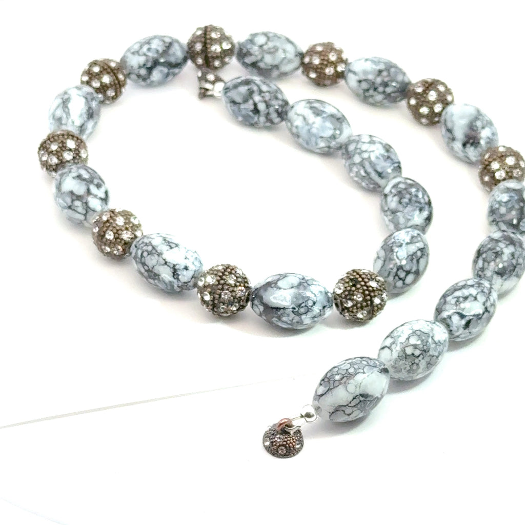 Black & White Marbled Beaded Necklace on white spiral overview