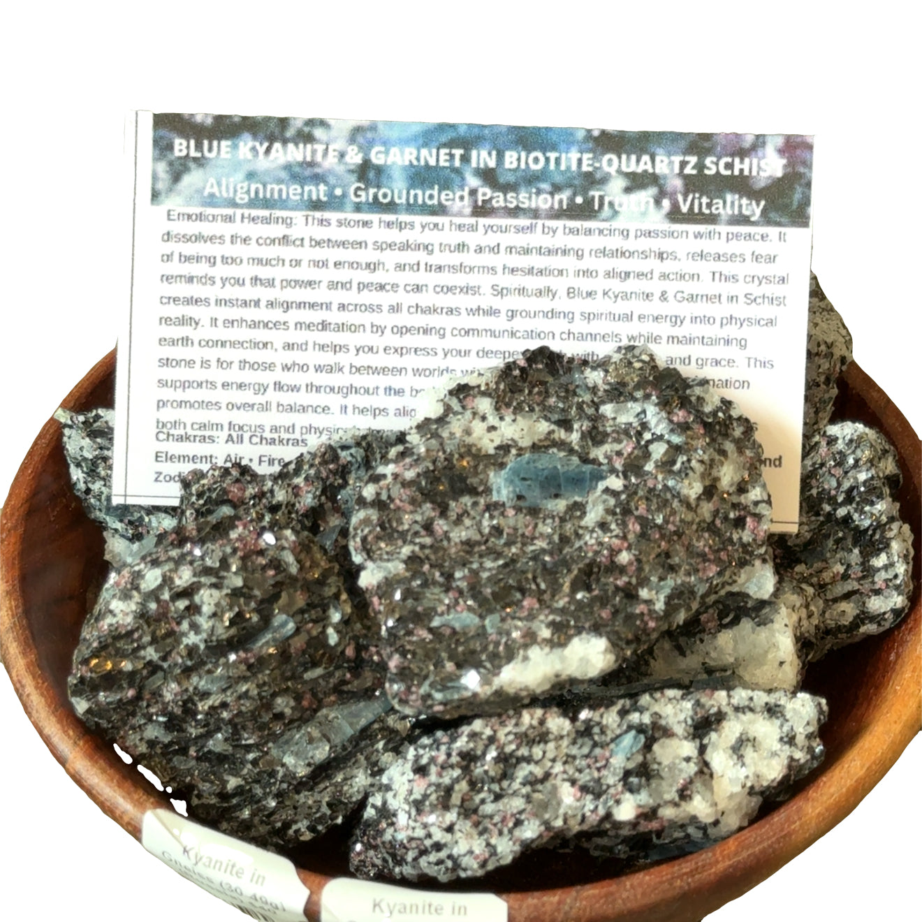Blue Kyanite in Gneiss gemstone specimen in a wooden bowl with descriptive card on a white background, front view. 