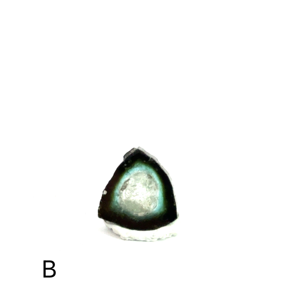 Blue Tourmaline Raw Gemstone Slice on white  B on front view