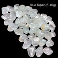 Blue topaz stones, 5-10g each, on a black background, front view.