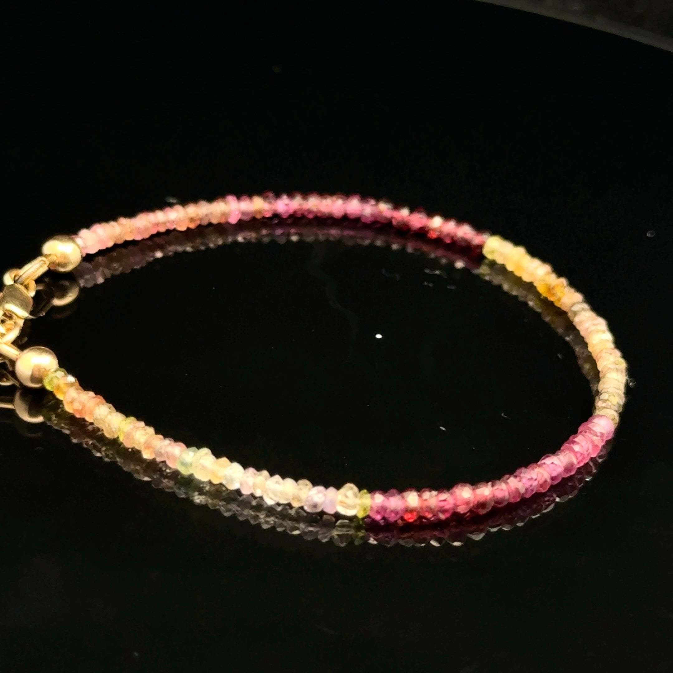 Brown sapphire bracelet with matching necklace earth tone jewelry set, on a black background size 6.75'', left side view. 