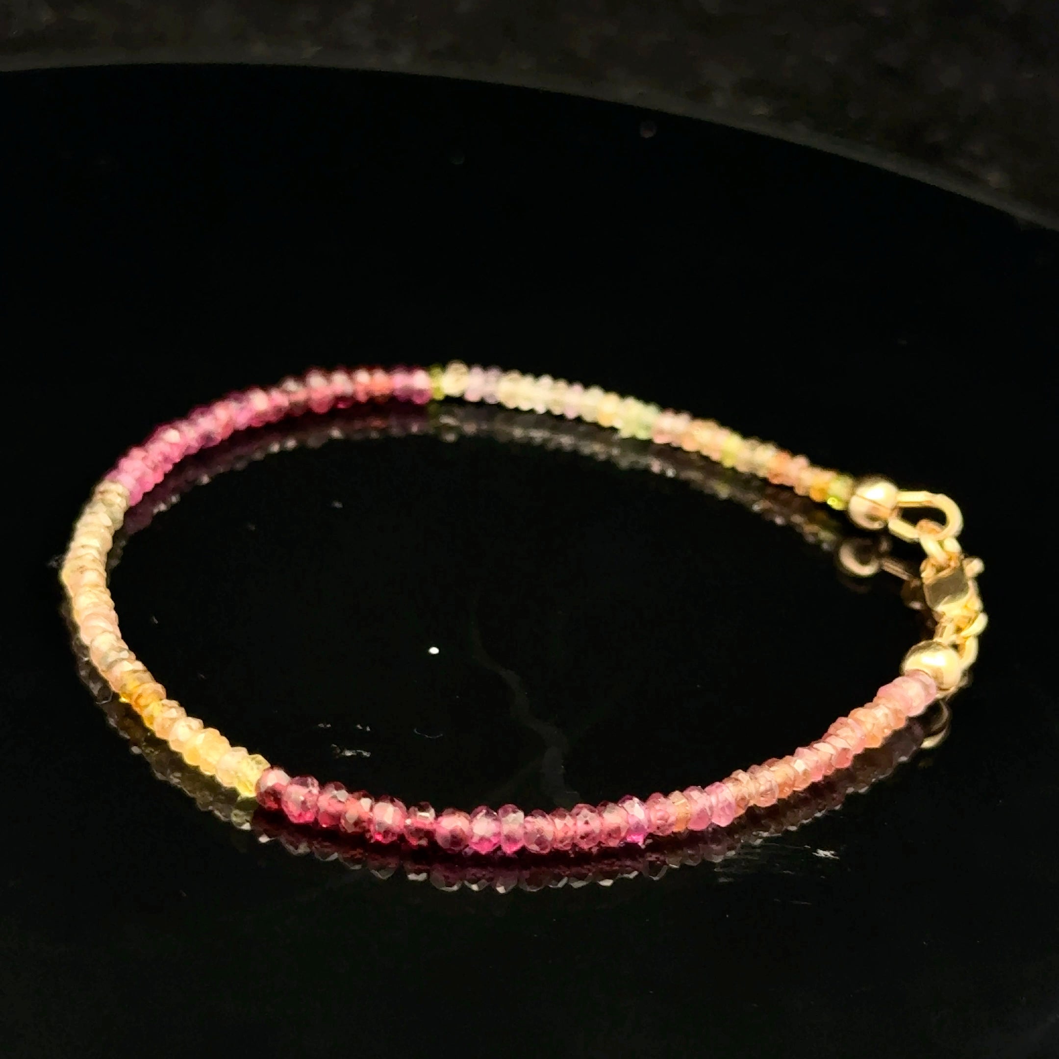 Brown sapphire bracelet with matching necklace earth tone jewelry set, on a black background size 6.75'', side view. 