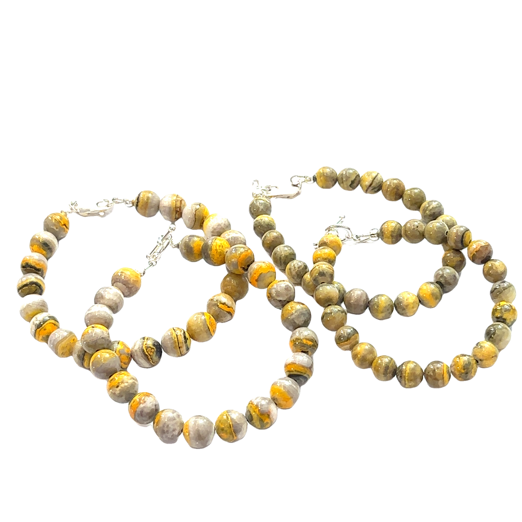 Bumble Bee Jasper Gemstone Bracelet grouping on white center overview