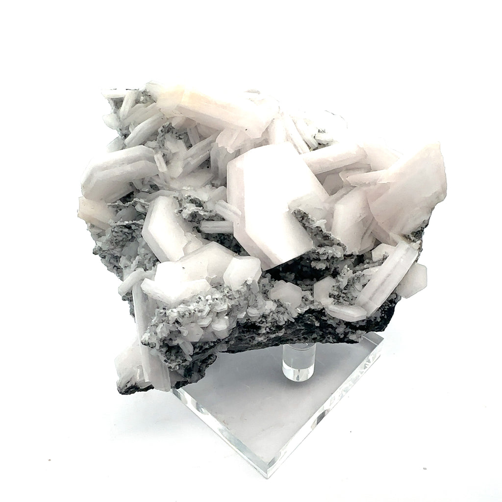 Calcite “Sandwich” Raw Gemstone on white top view 