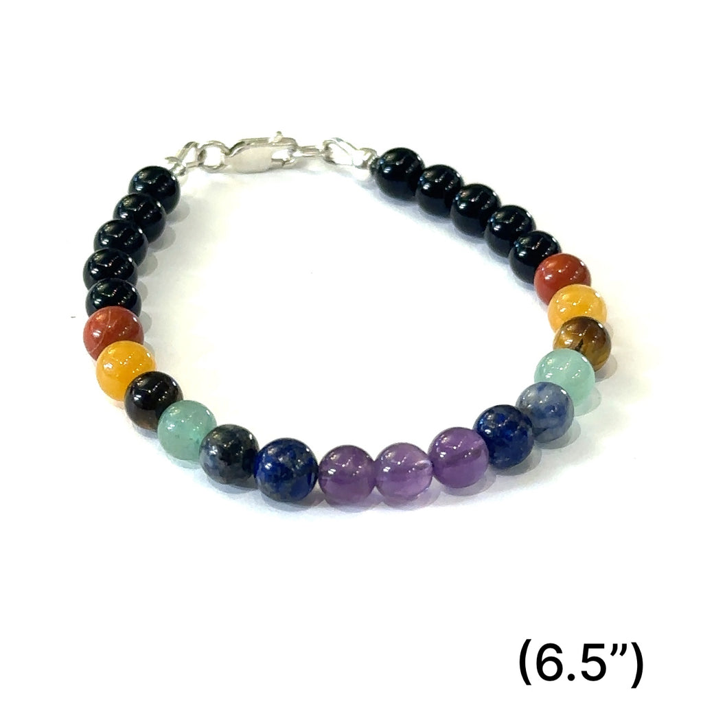 Chakra bracelet designed for energy balance and meditation size (6.5'' 6mm with black onyx gemstones) front overview.