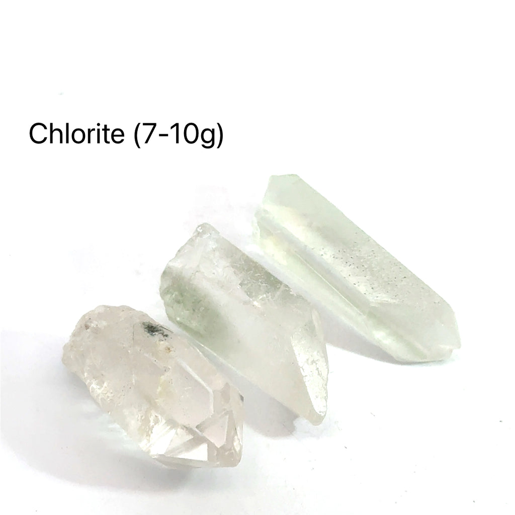 Chlorite Quartz Gemstone Point grouping 7-10g on white front view