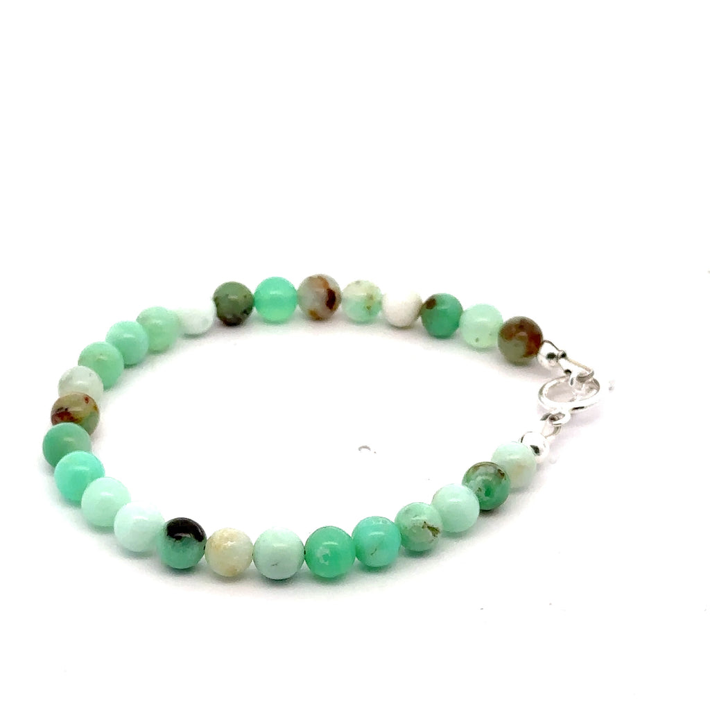 Chrysoprase Gemstone Bracelet grouping on white close up left angle overview