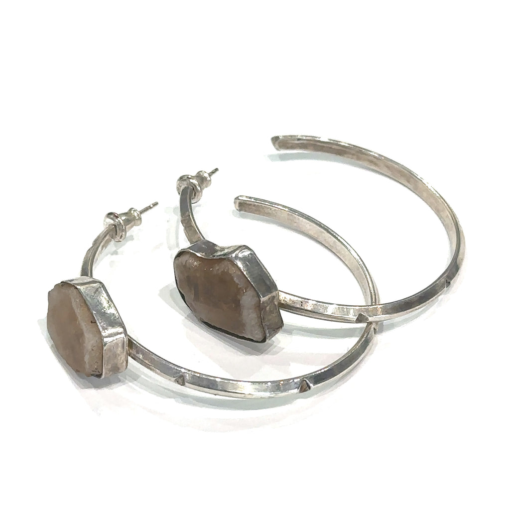 Citrine crystal jewelry for chakra balancing and prosperity on white angle view 