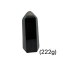 Close-up of a collection of Black Tourmaline crystal showing natural striations and deep black luster on a white background front view (222g)