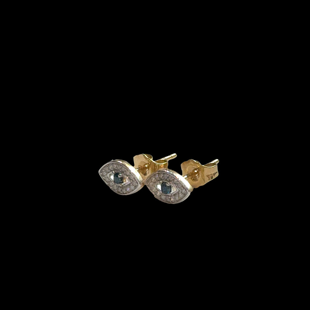 Close-up of gold evil eye studs with diamond accents, secure post backs, ancient talisman earrings, luxury protection jewelry, on a black background, front right angle view.