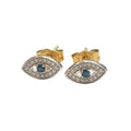 Close-up of gold evil eye studs with diamond accents, secure post backs, ancient talisman earrings, luxury protection jewelry, on a black background, front view.