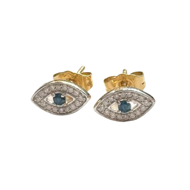 Close-up of gold evil eye studs with diamond accents, secure post backs, ancient talisman earrings, luxury protection jewelry, on a black background, front view.