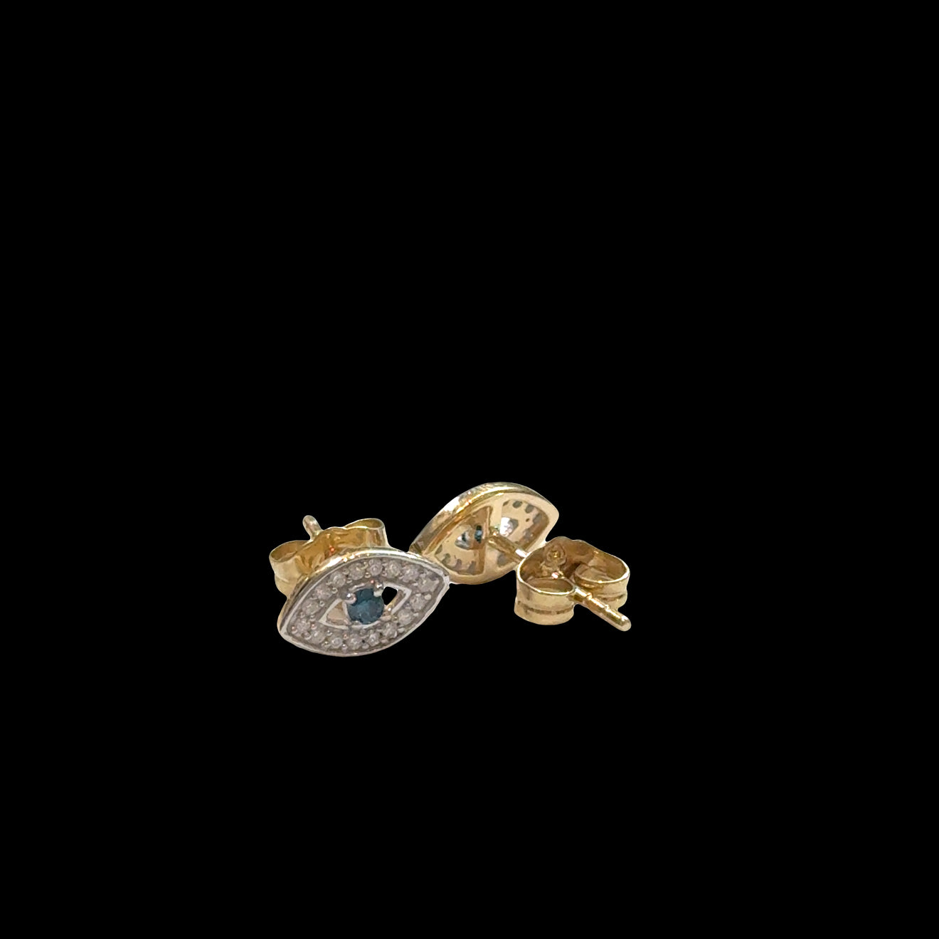 Close-up of gold evil eye studs with diamond accents, secure post backs, ancient talisman earrings, luxury protection jewelry, on a black background, one front and one back view.