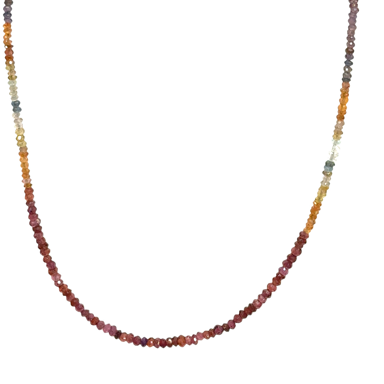 Close-up of natural brown sapphire beads showing honey amber to chocolate color variations, on a white background,  in a hanging front view. 