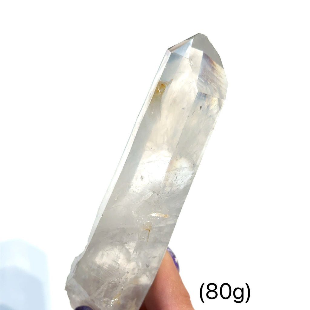Colombian Blue Mist Lemurian Quartz Point 80g in hand on white front view
