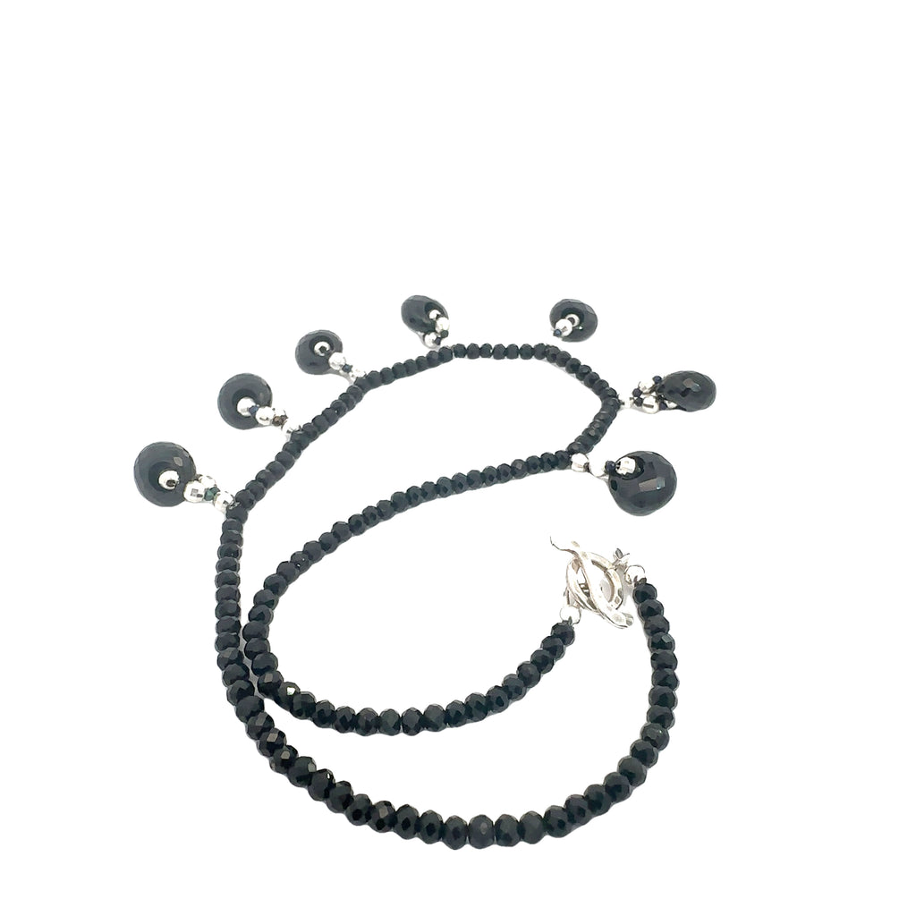 Crystal healing necklace with Black Tourmaline and Black Spinel beads for positivity and aura protection on white back side overview