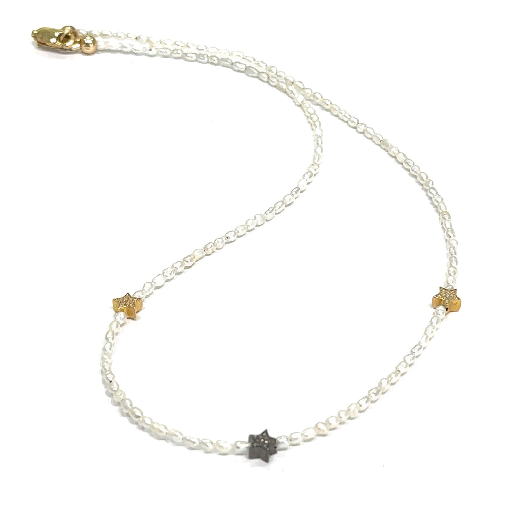 Dainty freshwater pearl necklace with paved gold‑filled and oxidized star accents