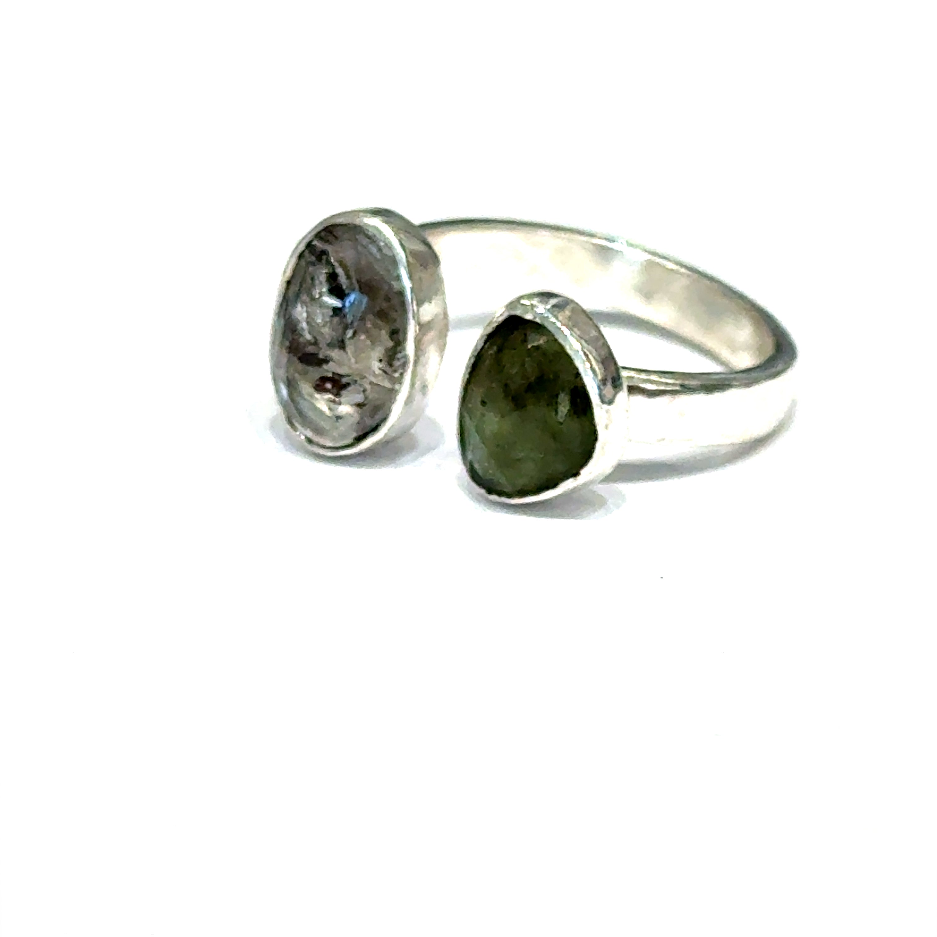 Dream Maker sterling silver ring featuring Moldavite and Herkimer Diamond gemstones on a simple 3mm band, handcrafted by Hidden Jewel of the South End on a white background slight left front angle view.