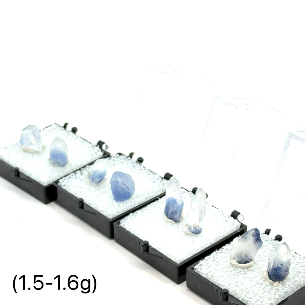 Dumortierite in Quartz 1.5=1.6g on white in perky box front view 