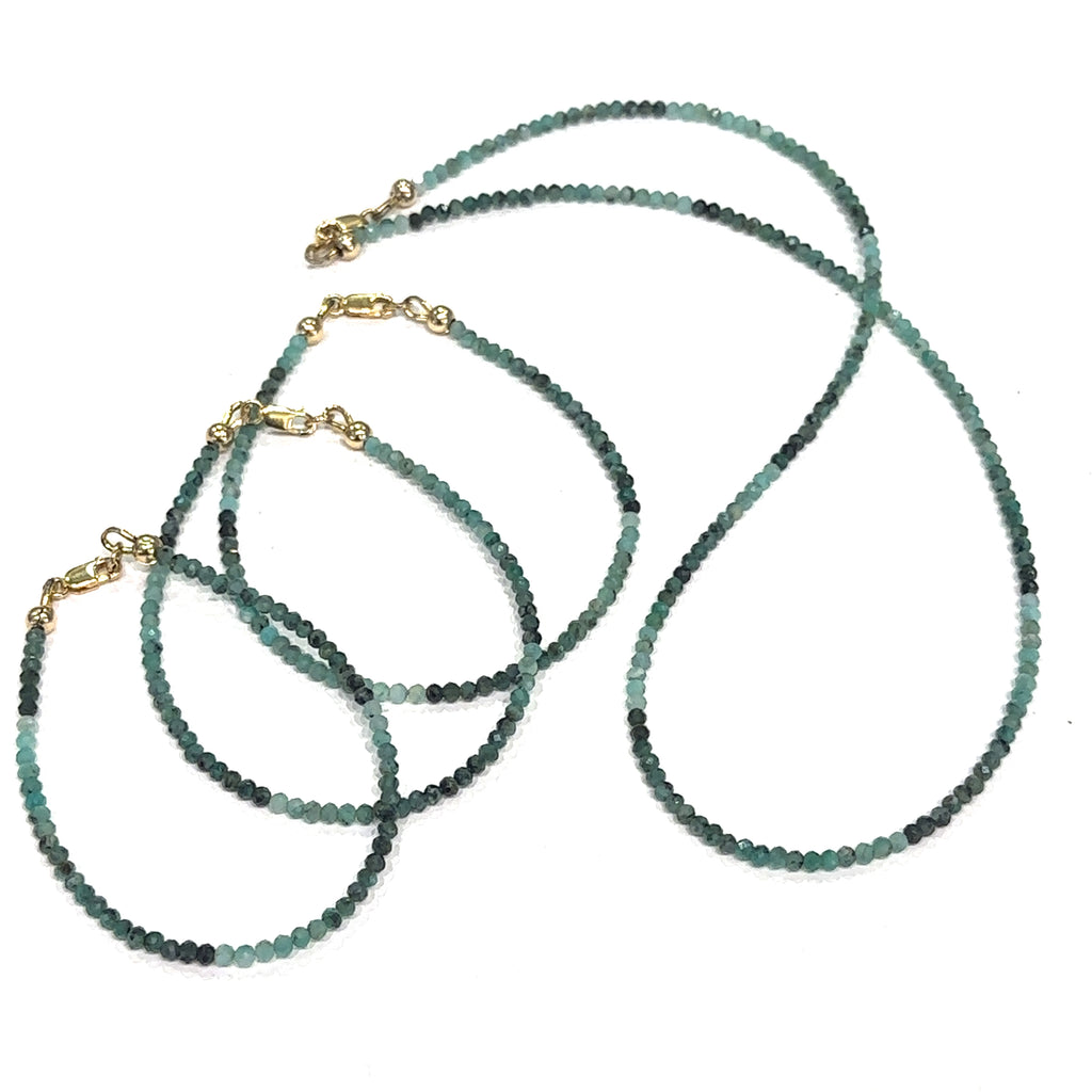 Durable Beadalon wire Emerald bracelet with matching necklace option on white center overview