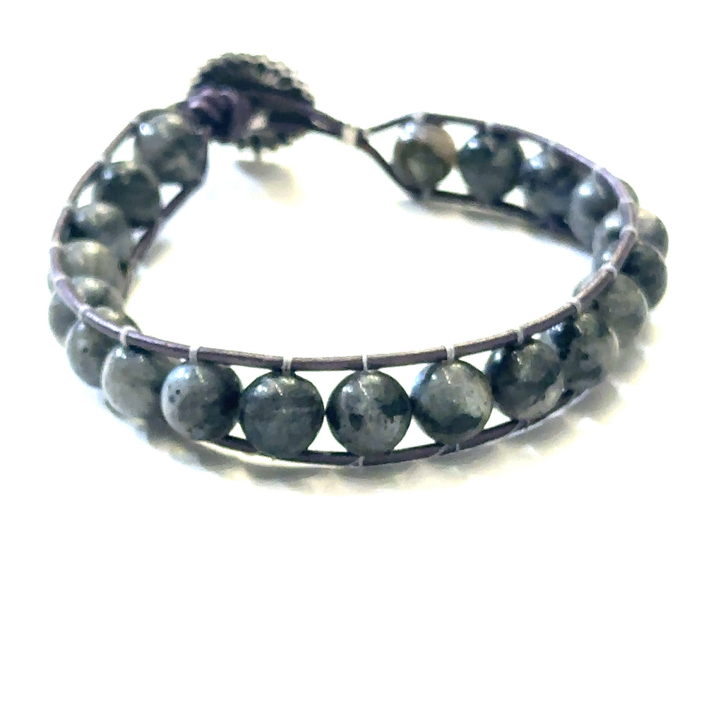 Durable Fireline thread Larvikite leather wrap bracelet with sunflower clasp on white front view