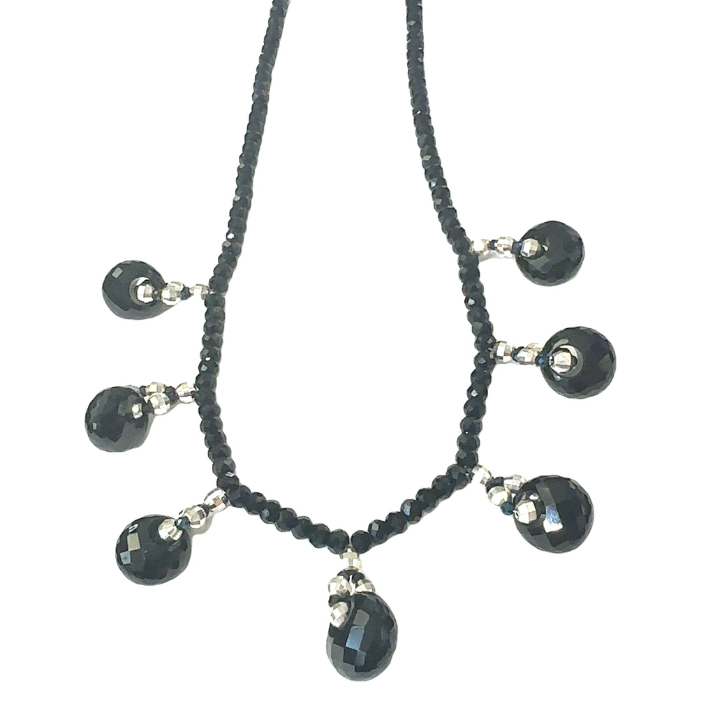 Elegant 16.5 inch Black Tourmaline & Spinel necklace with toggle clasp, perfect for evening wear on white hanging overview