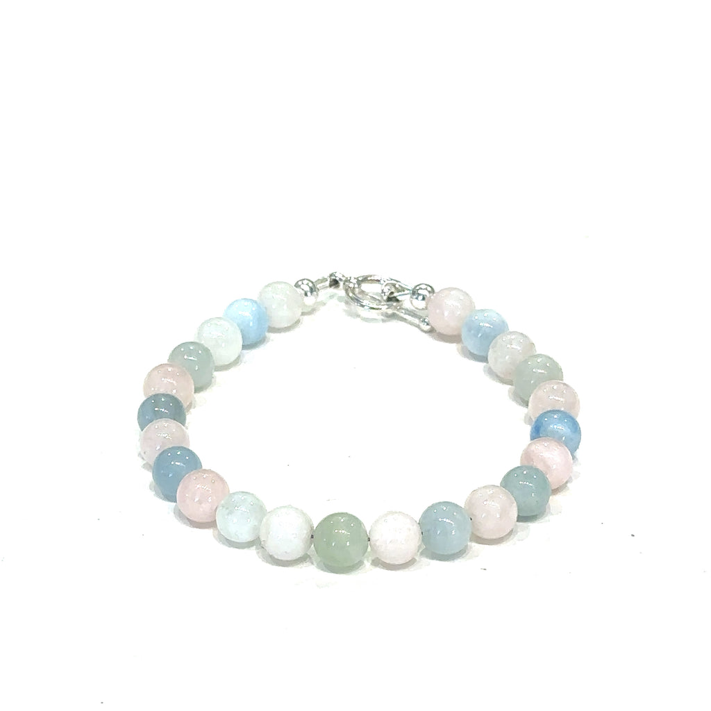 Elegant Morganite crystal bracelet available in sizes 6.25"–7.25" on white center overview