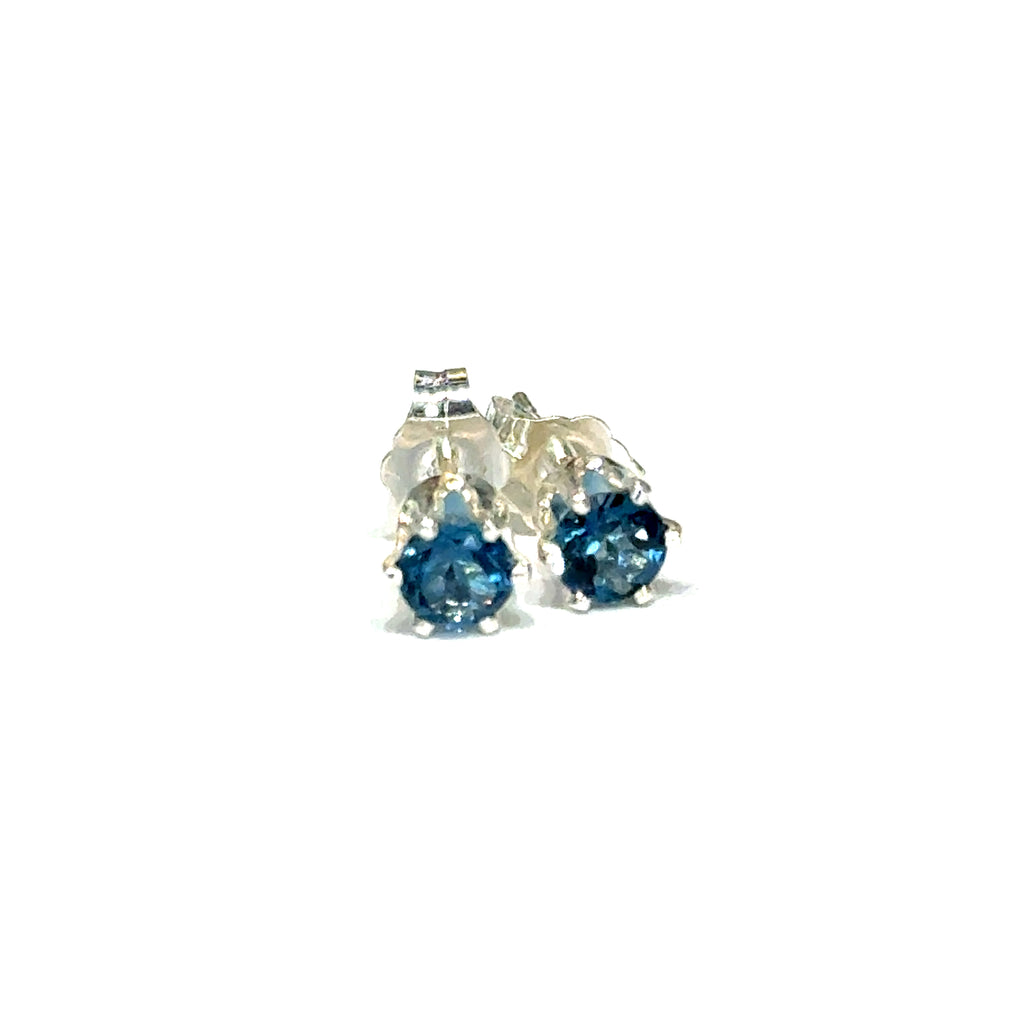 Elegant handmade London Blue Topaz earrings for the November birthstone gift on a white background, front overview.