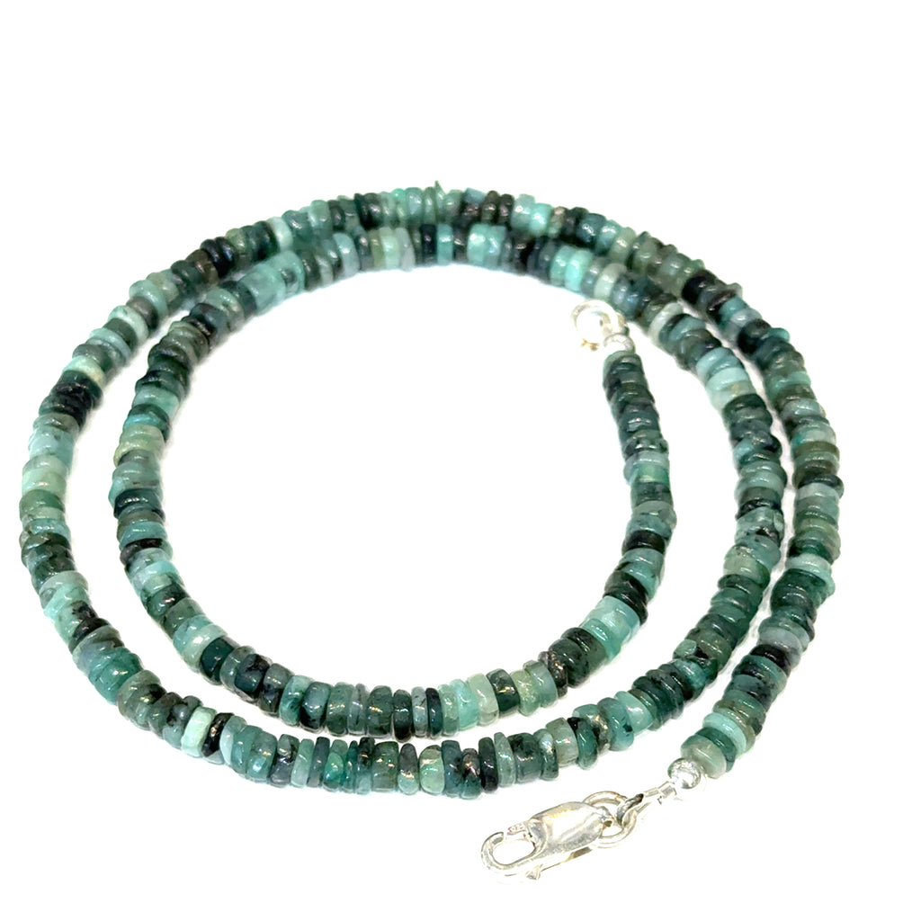 Emerald gemstone  Necklace on white center spiral overview