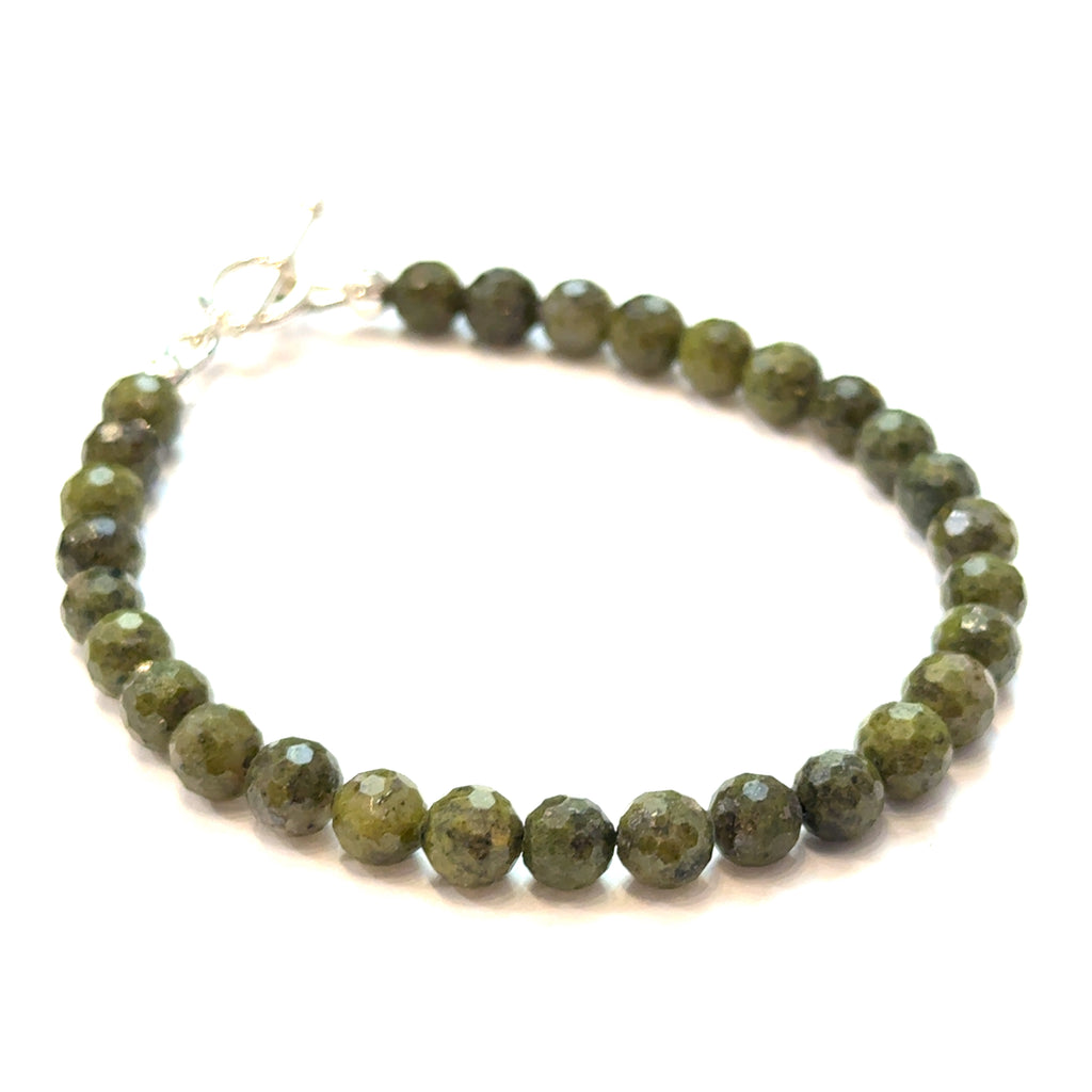 Epidote Gemstone Beaded Bracelet on white front center left angle  overview