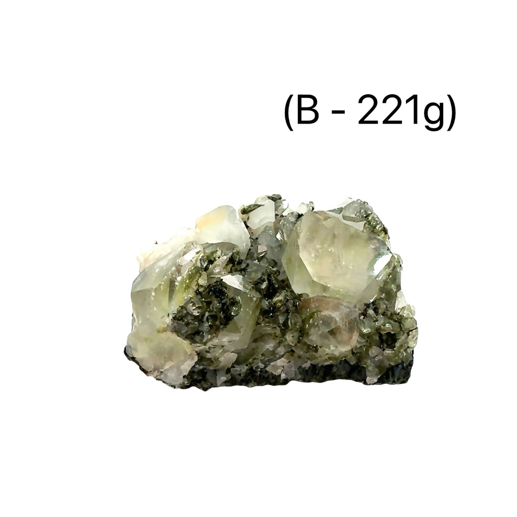 Epidote in Quartz Gemstone Cluster on white B-221g close up view